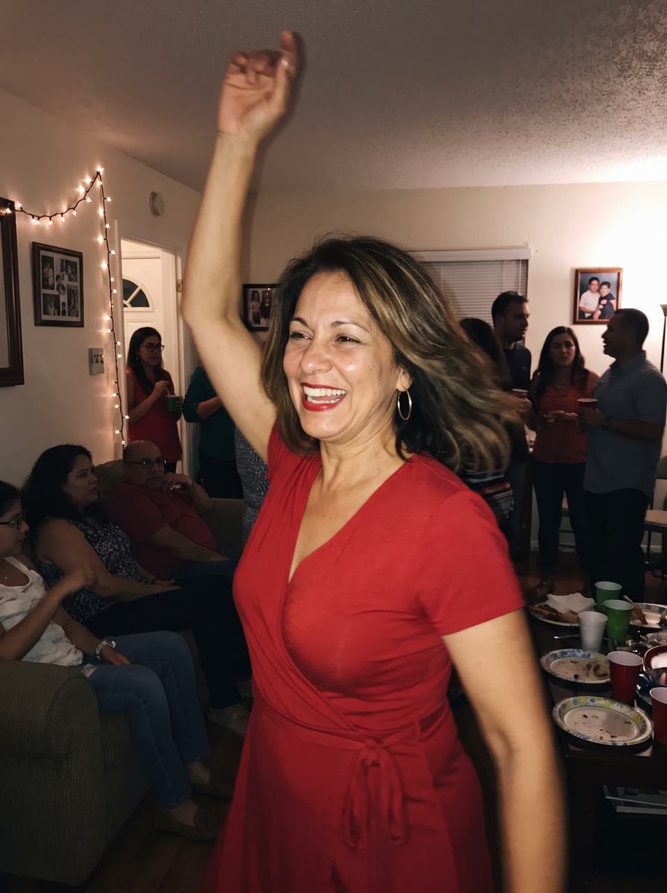 The photo marisol's living-room salsa, shot like a music video started from
