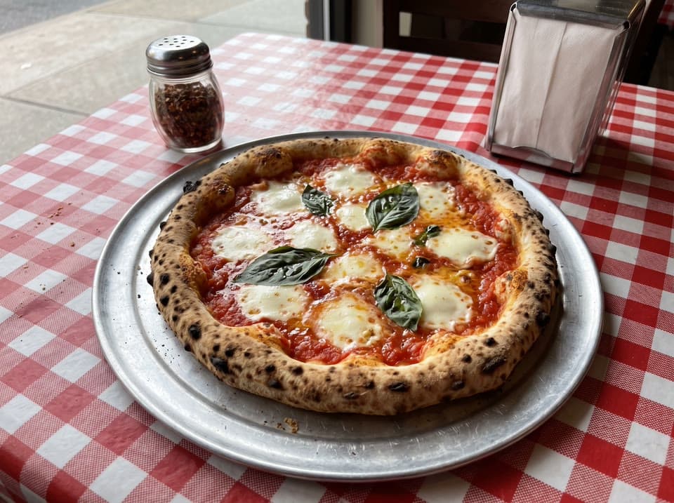 The photo a margherita, the cheese pull started from