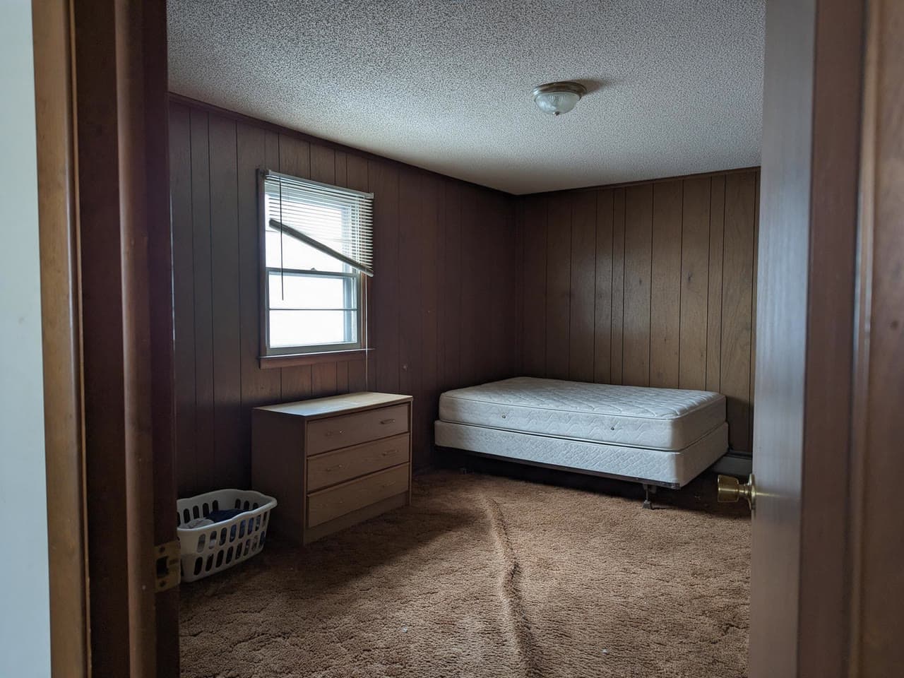 The photo wood-panelled bedroom, japandi started from