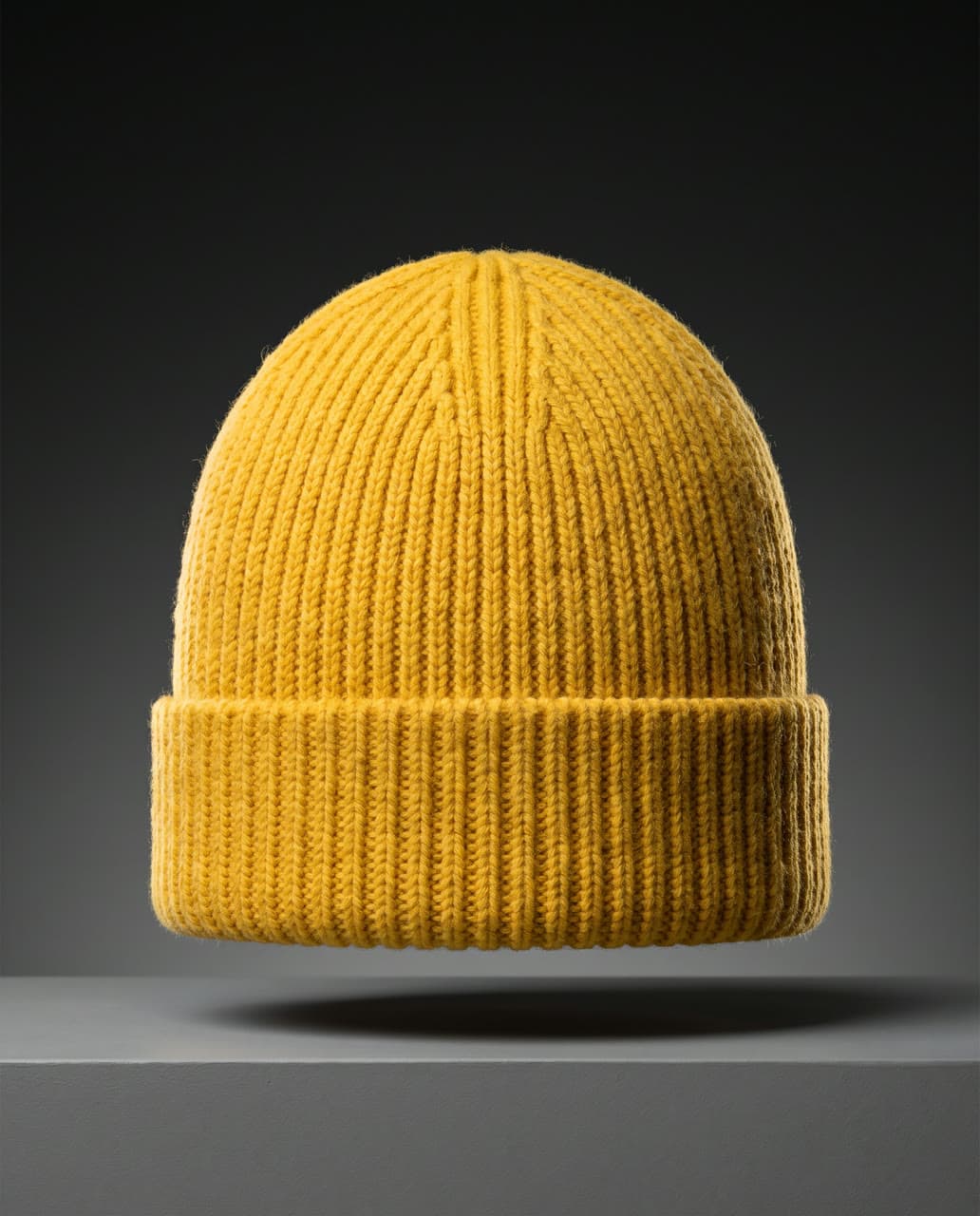 Mustard beanie floating on graphite, a real run on Leap