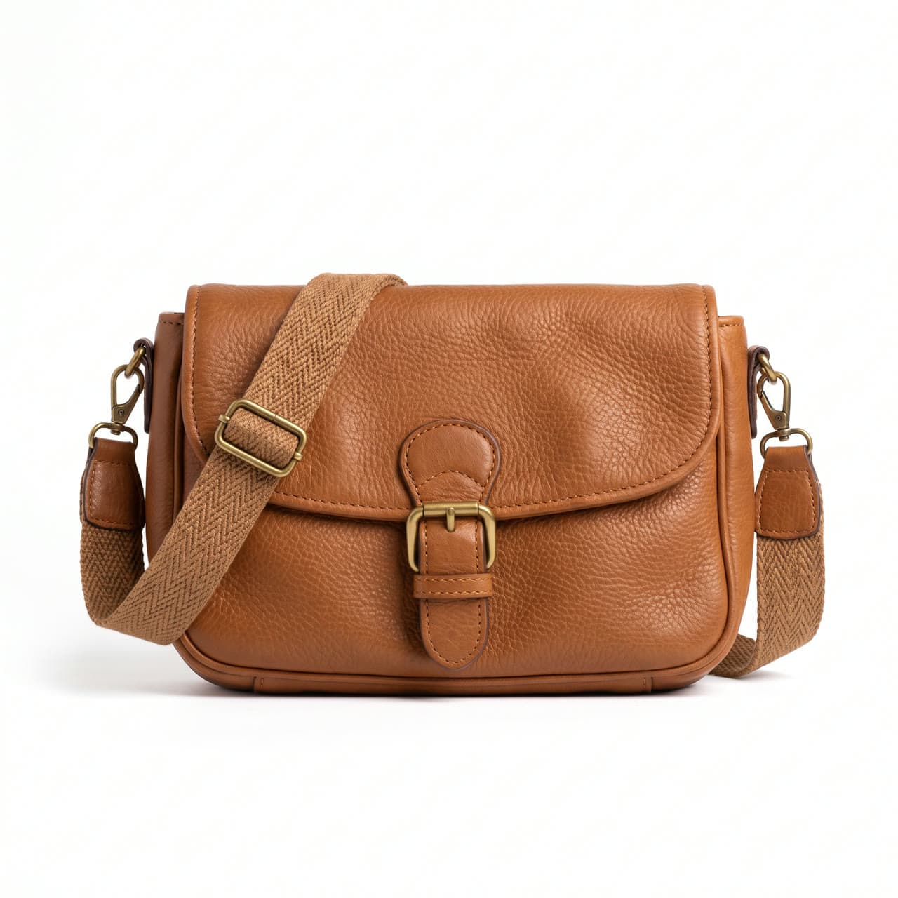 Tan crossbody bag on pure white, a real run on Leap