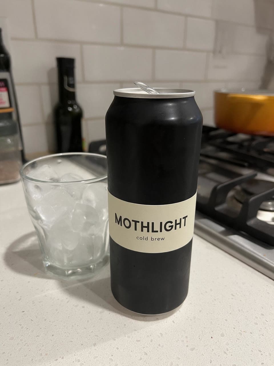 The photo black cold brew can on pure white started from