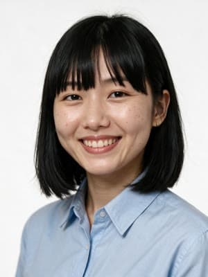 A headshot on the bright white backdrop